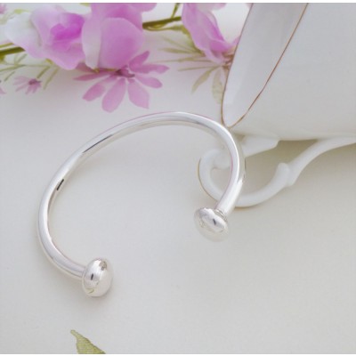 Rebecca silver ladies torque bangle bracelet in a small size, solid silver available to buy online in the UK
