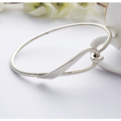 Lyra Loop Silver Bangle with a hook and a loop connector