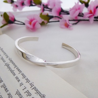 Kendra twist sterling silver bangle 