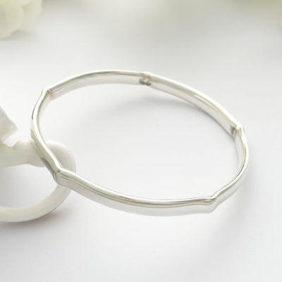 Indie Solid Silver Bangle with five crimps for a unique look Indie Solid Silver Bangle with five crimps for a unique look