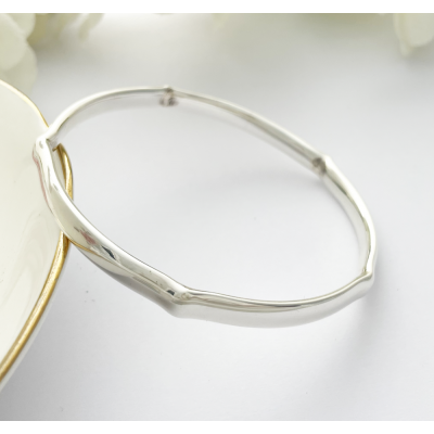 Indie Solid Silver Bangle with five crimps for a unique look Indie Solid Silver Bangle with five crimps for a unique look