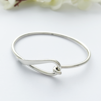 Lyra Loop Silver Bangle with a hook and a loop connector Lyra Loop Silver Bangle with a hook and a loop connector