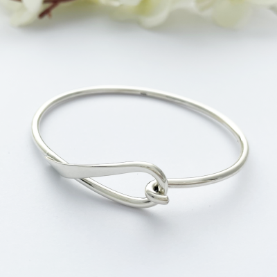 Lyra Loop Silver Bangle with a hook and a loop connector