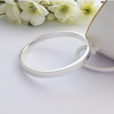 Anna bangle in a small size with personalised engraving inside and outside in solid 925 sterling silver