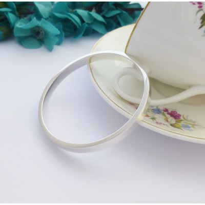 Anna bangle in a small size with personalised engraving inside and outside in solid 925 sterling silver Anna bangle in a small size with personalised engraving inside and outside in solid 925 sterling silver
