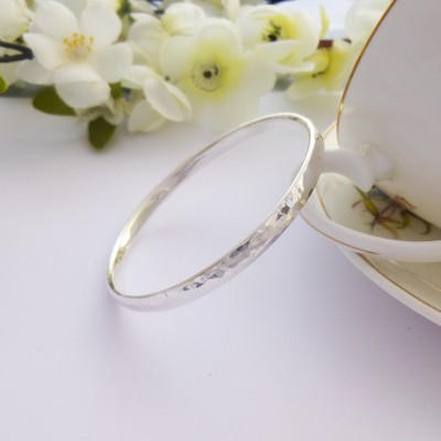 Ladies hand hammered bangle in small size, solid silver