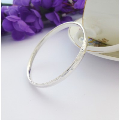 Edie personalised hammered bracelet in s925 sterling silver with optional free engraving on the inside, hand made in the UK 