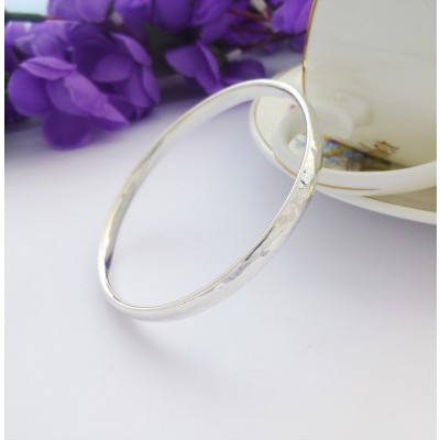 Ladies hand hammered bangle in small size, solid silver Ladies hand hammered bangle in small size, solid silver