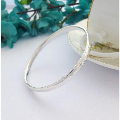 Edie large sized hand hammered solid silver bangle for women with large wrists in the UK