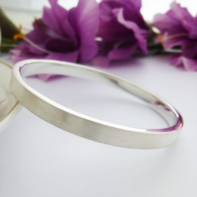 Elsa engraved personalised brushed exterior silver bangle from Guilty