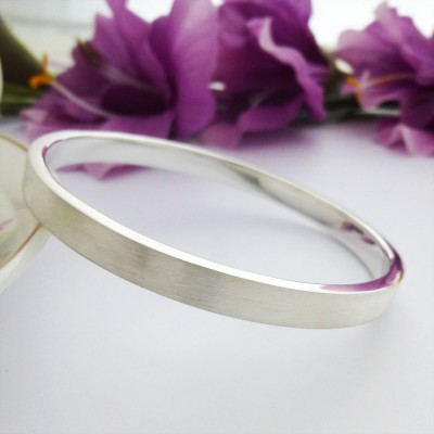 Elsa small size silver bangle bracelet online in the UK with frosted exterior Elsa small size silver bangle bracelet online in the UK with frosted exterior