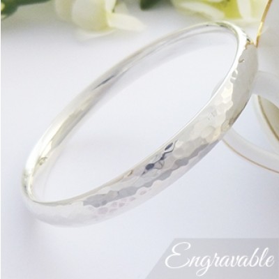 Kelly hand hammered silver bangle for small knuckles and wrists, handmade in the UK