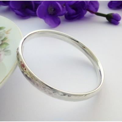 Kelly hand hammered silver bangle for small knuckles and wrists, handmade in the UK