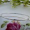 Sterling silver bangle with linear textured effect Sterling silver bangle with linear textured effect
