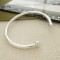 Men's solid silver torque bangle with round ball ends