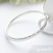 Edie large sized hand hammered solid silver bangle for women with large wrists in the UK
