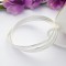 Three silver bangles interlinked in sterling silver Three silver bangles interlinked in sterling silver