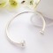 Rebecca silver ladies torque bangle bracelet in a small size, solid silver available to buy online in the UK Rebecca silver ladies torque bangle bracelet in a small size, solid silver available to buy online in the UK
