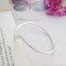 Talia shaped silver bangle Talia shaped silver bangle