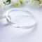 Tawny Chunky ladies bangle with a single twist and wide fit