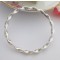 Tia twisted silver bangle suitable for larger wrists