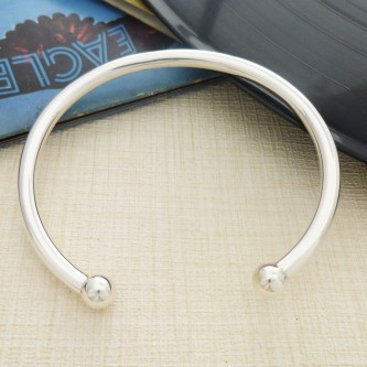 Men's solid silver torque bangle