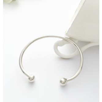 ladies 925 sterling silver torque bangle with ball ends from Guilty