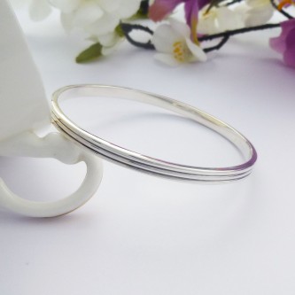 Phoebe large sterling silver bangle personalised interior and two grooves around the outside