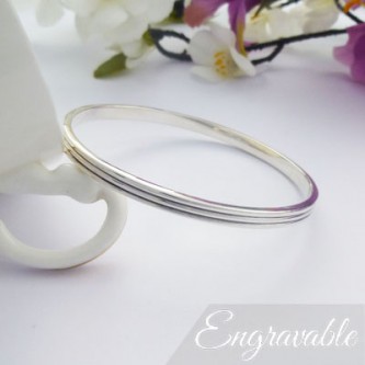 Phoebe silver bangle engraved inside