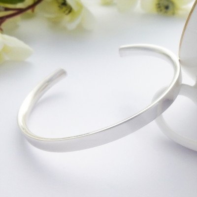 Alexa sterling silver ladies torque bangle