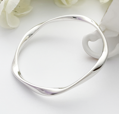 Payton five twist solid silver bangle hand made in the UK for Guilty, best seller